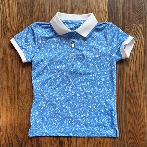 Blue Polo Shirt with Floral Print and White Accents